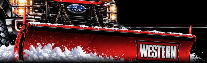 Red Western snow plow blade throwing snow off the front of a black pickup.